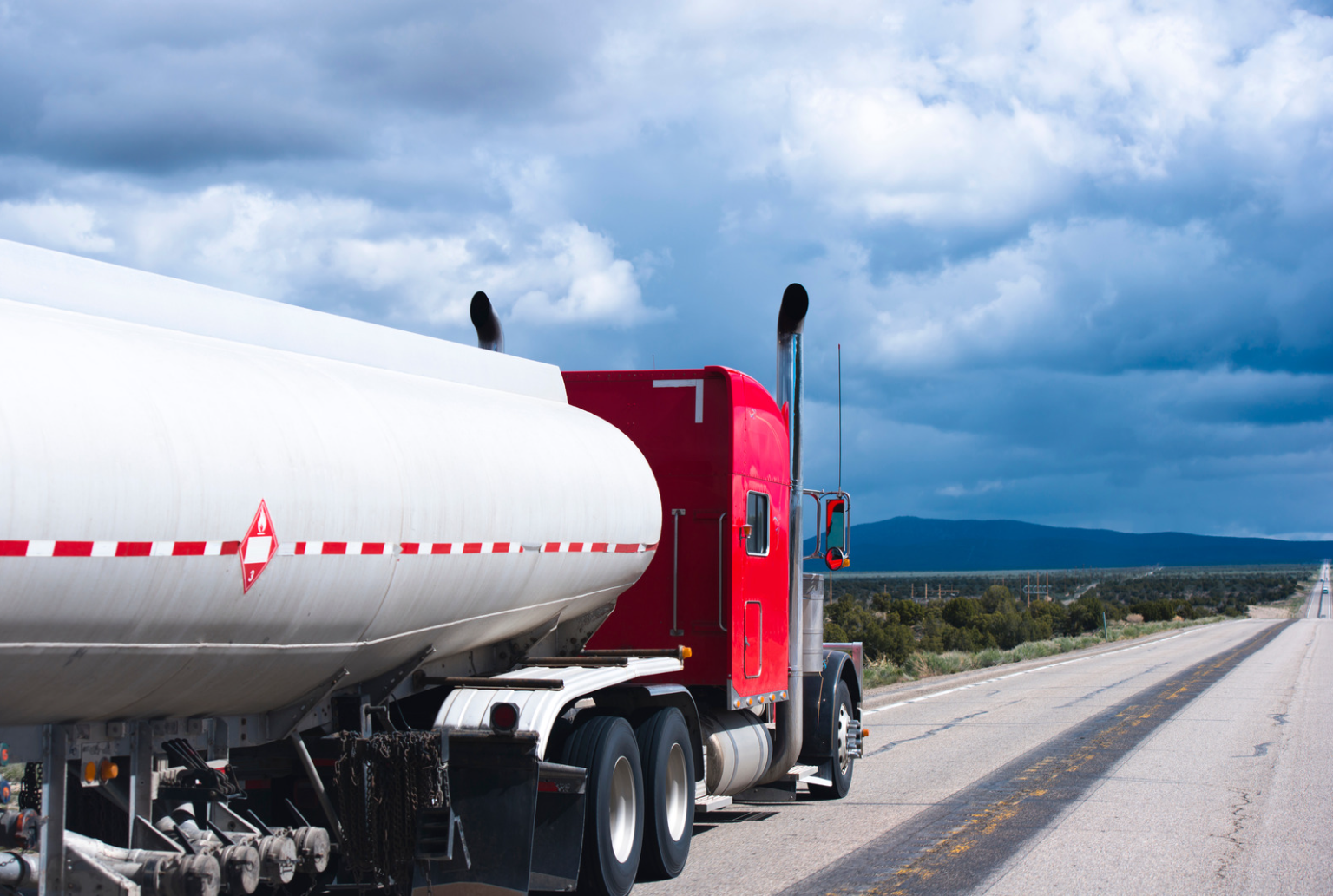 big liquid truck carrying hazardous flammable chemical