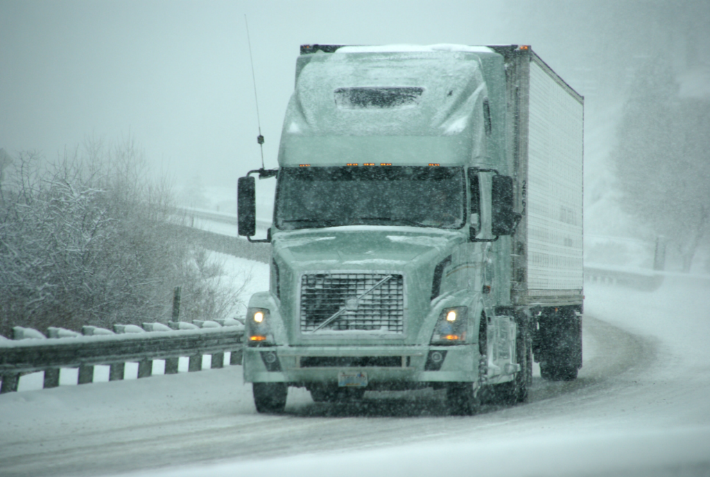 ice road truck on a snowy winter road