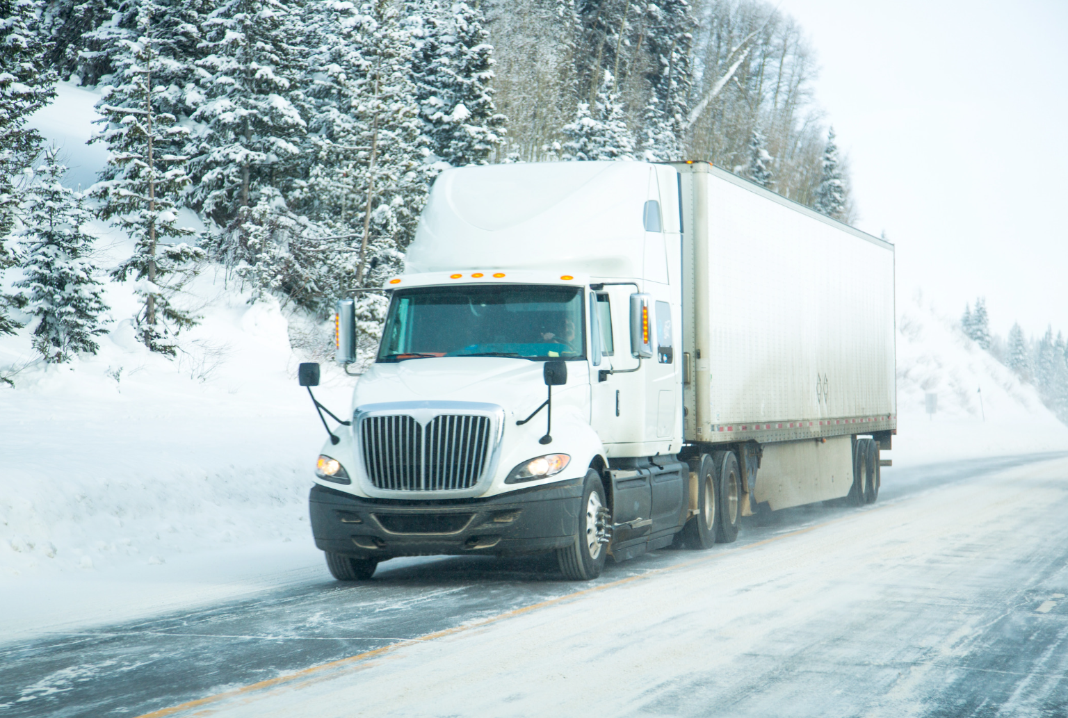 white ice road truck on a winter