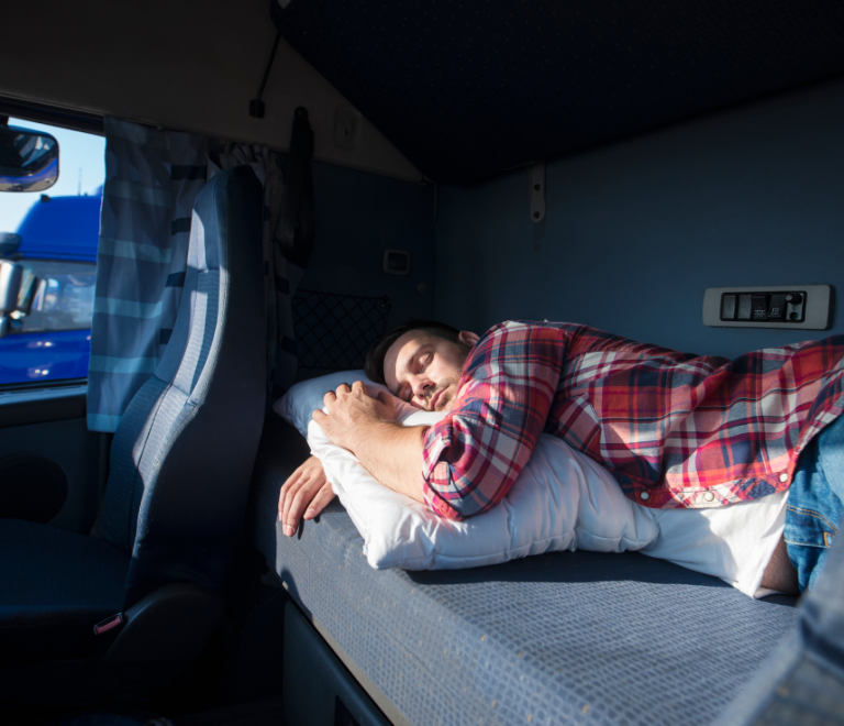 truck driver sleeping in the truck