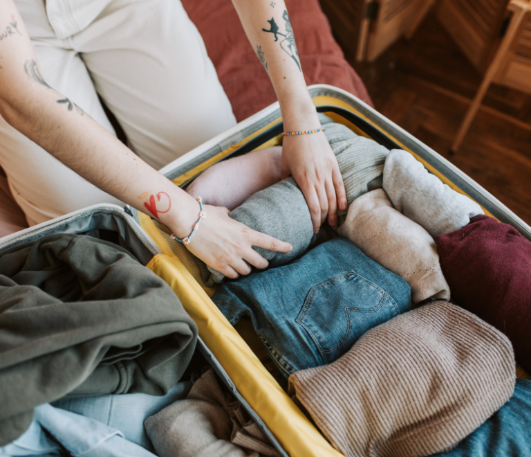 truck driver packing clothes for long haul