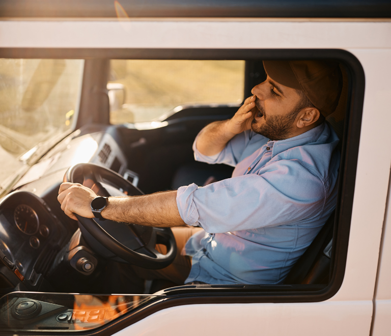 yawning truck driver