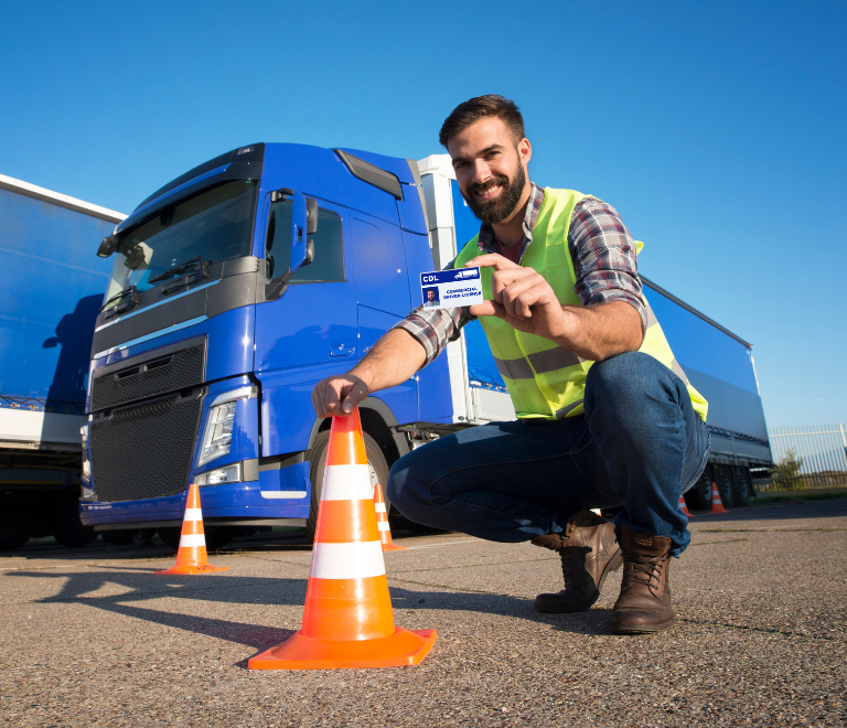 truck driver showing his commercial driver's license